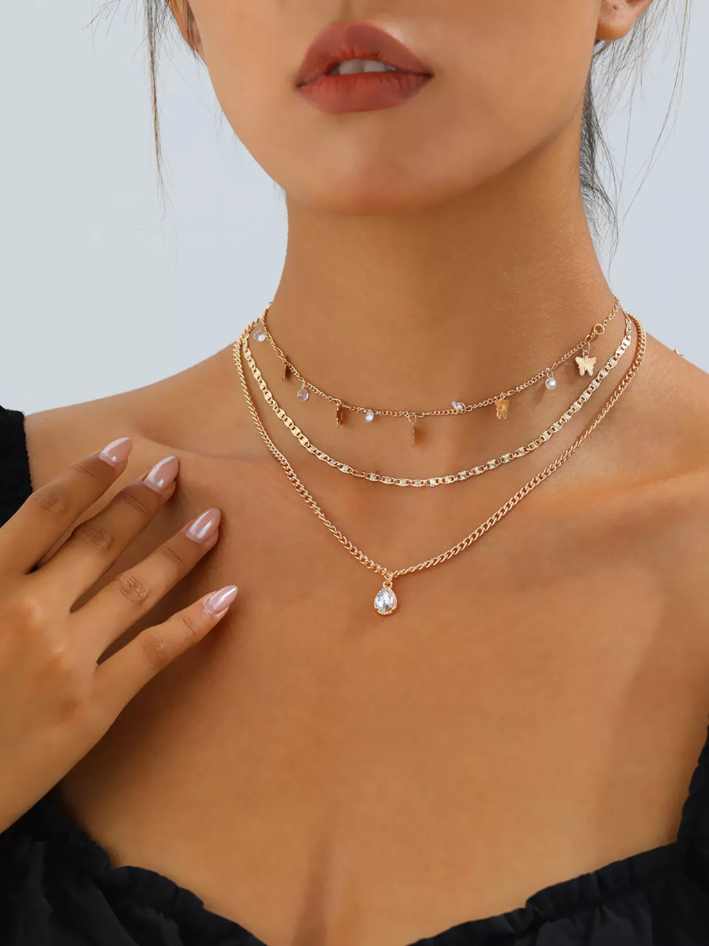 Layered Alloy Necklace with Butterfly and Zircon Charms