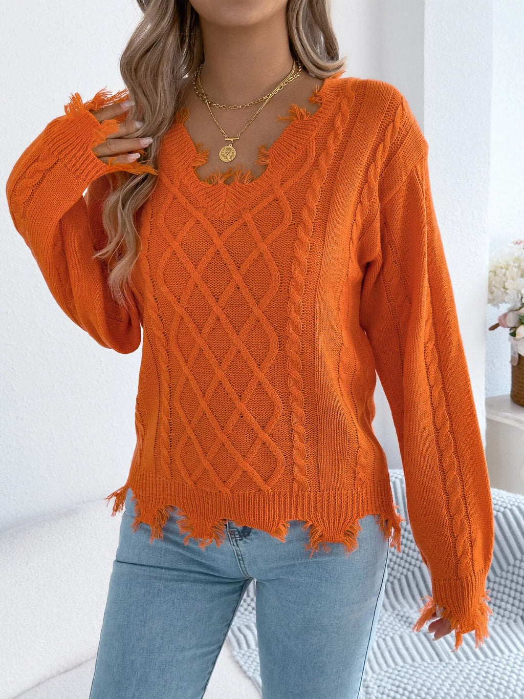 V-Neck Distressed Hem Cable Knit Sweater