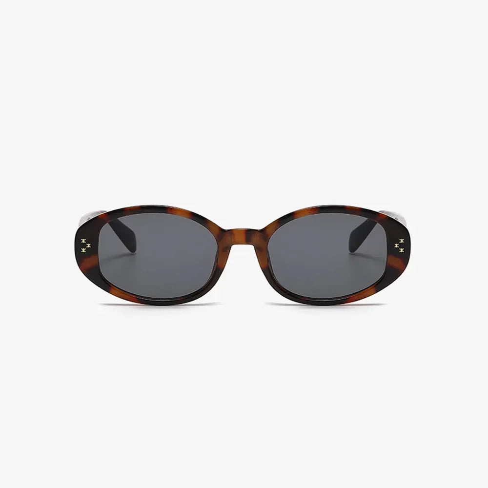 Polycarbonate Oval Sunglasses in a Tortoiseshell Pattern