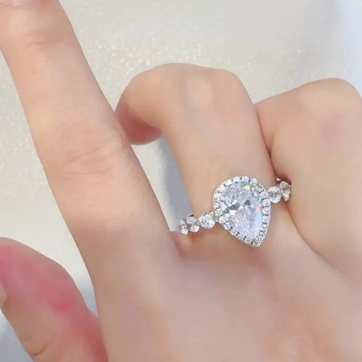 2 Carat Pear-Shaped Moissanite Halo Ring in 925 Sterling Silver