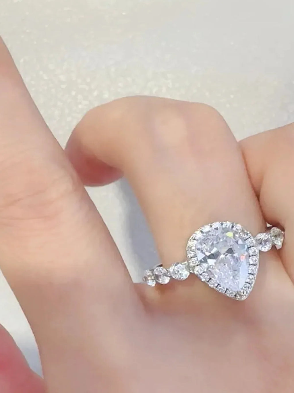 2 Carat Pear-Shaped Moissanite Halo Ring in 925 Sterling Silver
