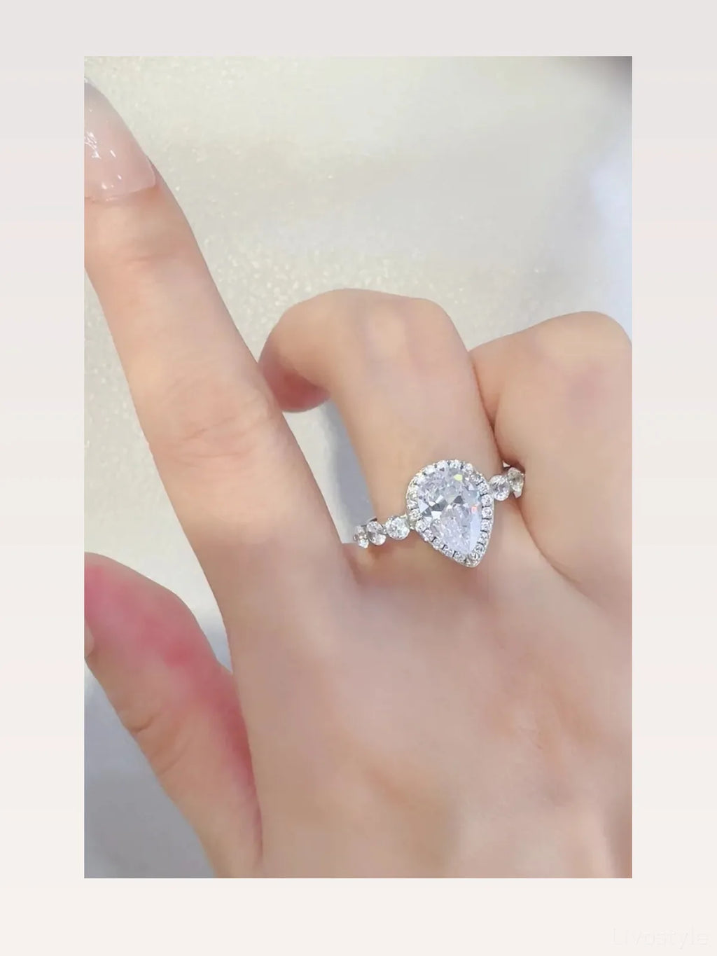 2 Carat Pear-Shaped Moissanite Halo Ring in 925 Sterling Silver