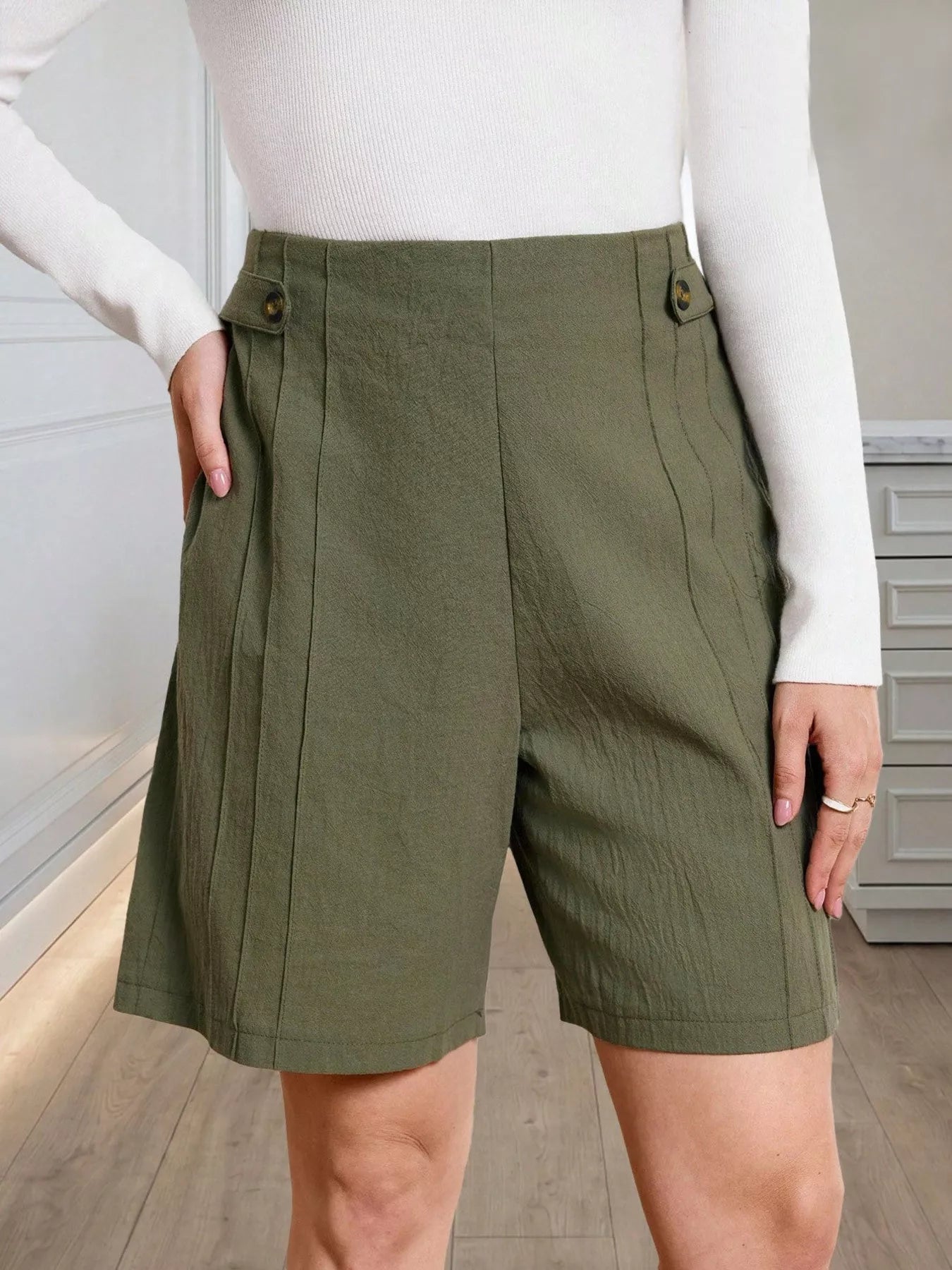 High-Waisted Pleated Shorts with Button Detail