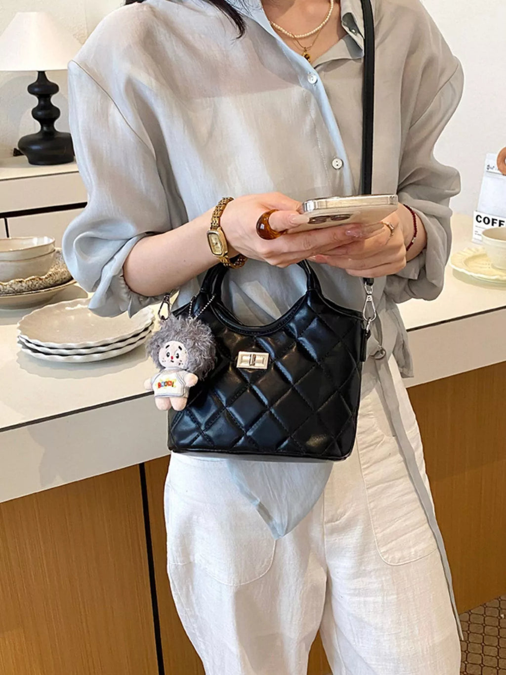 Quilted Crossbody Bag with Plush Charm