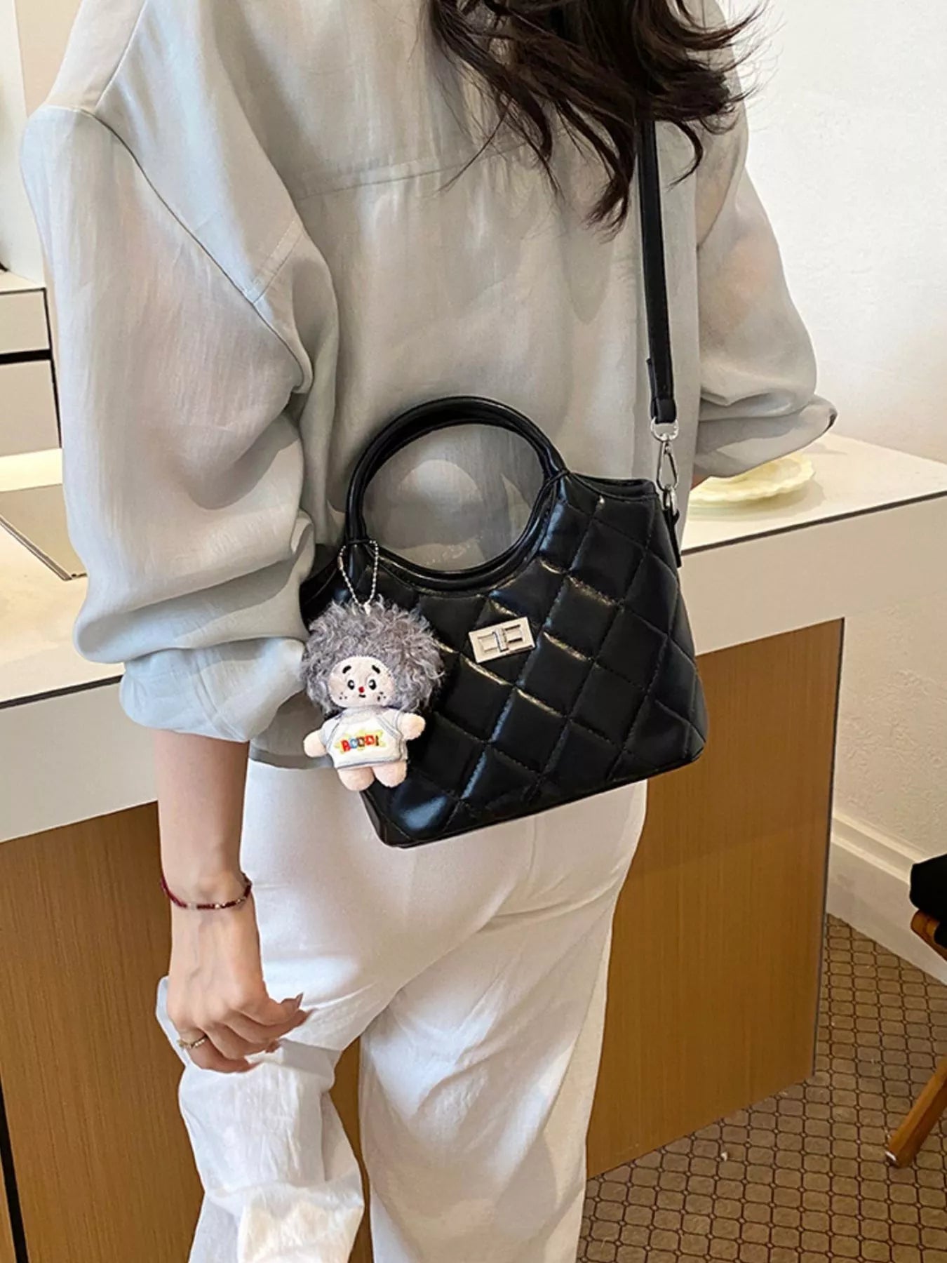 Quilted Crossbody Bag with Plush Charm