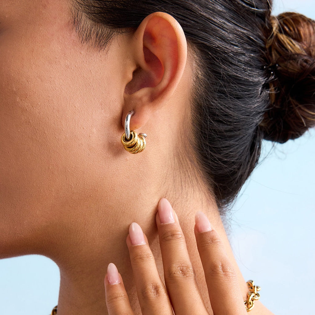18K gold C-shaped earrings with a hoop design