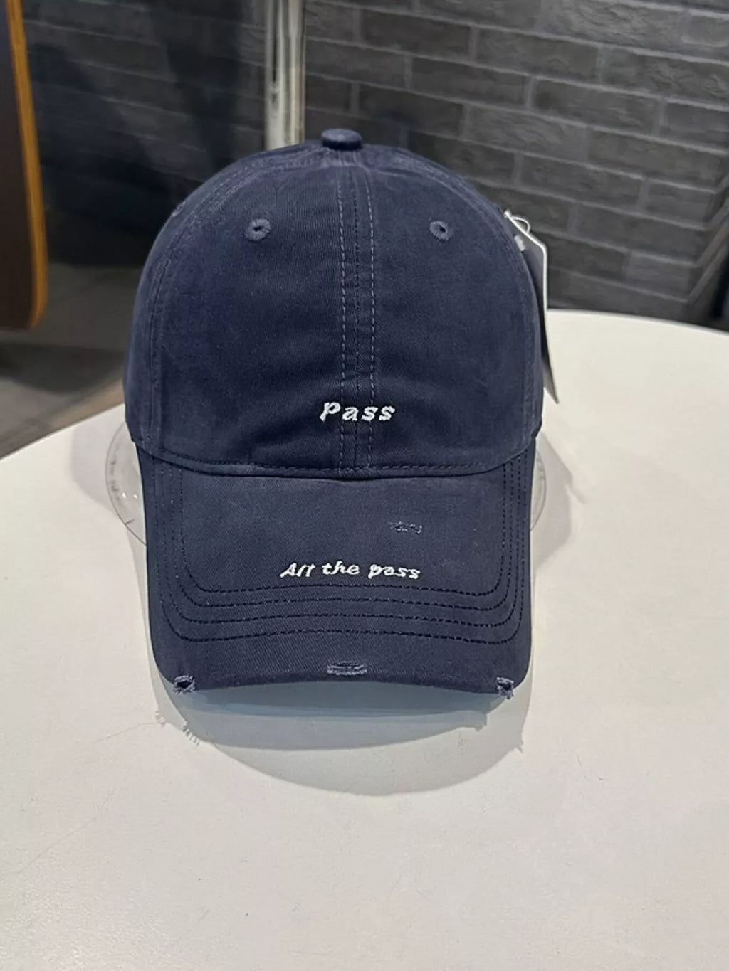 Distressed Baseball Cap with Embroidered Slogan