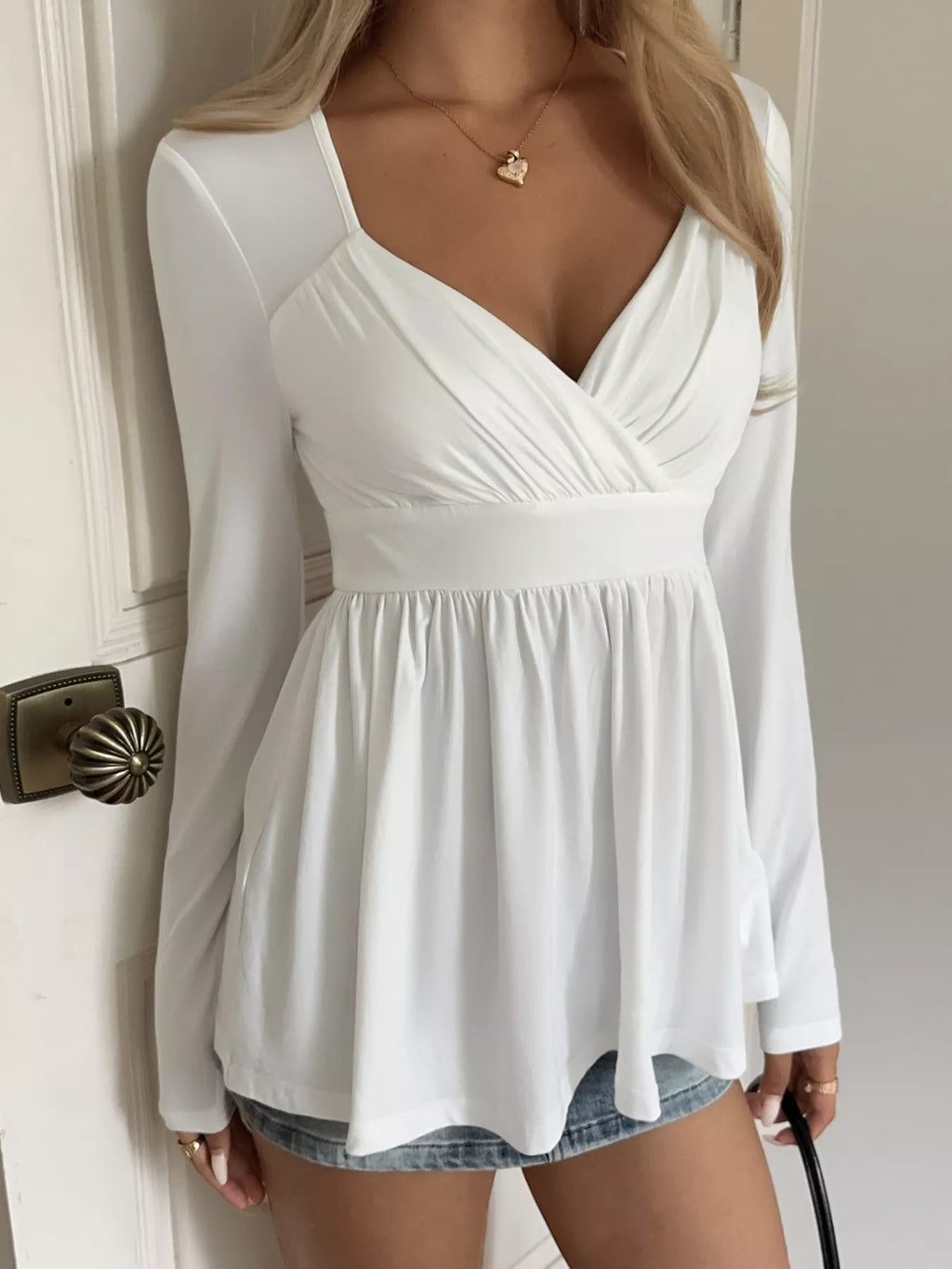 Surplice Peplum Long Sleeve Top