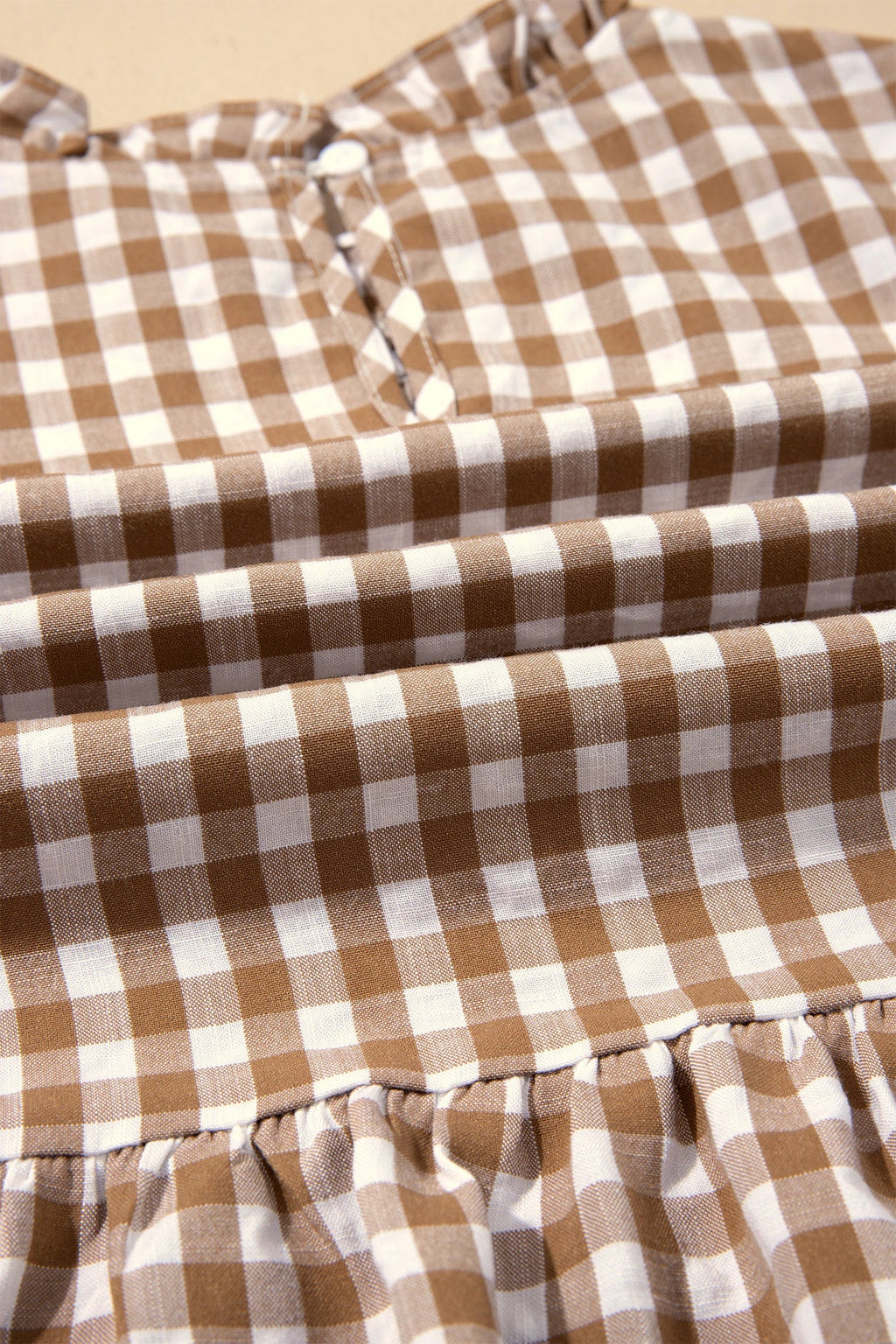 Gingham Smocked 3/4 Sleeve Ruffle Peplum Top