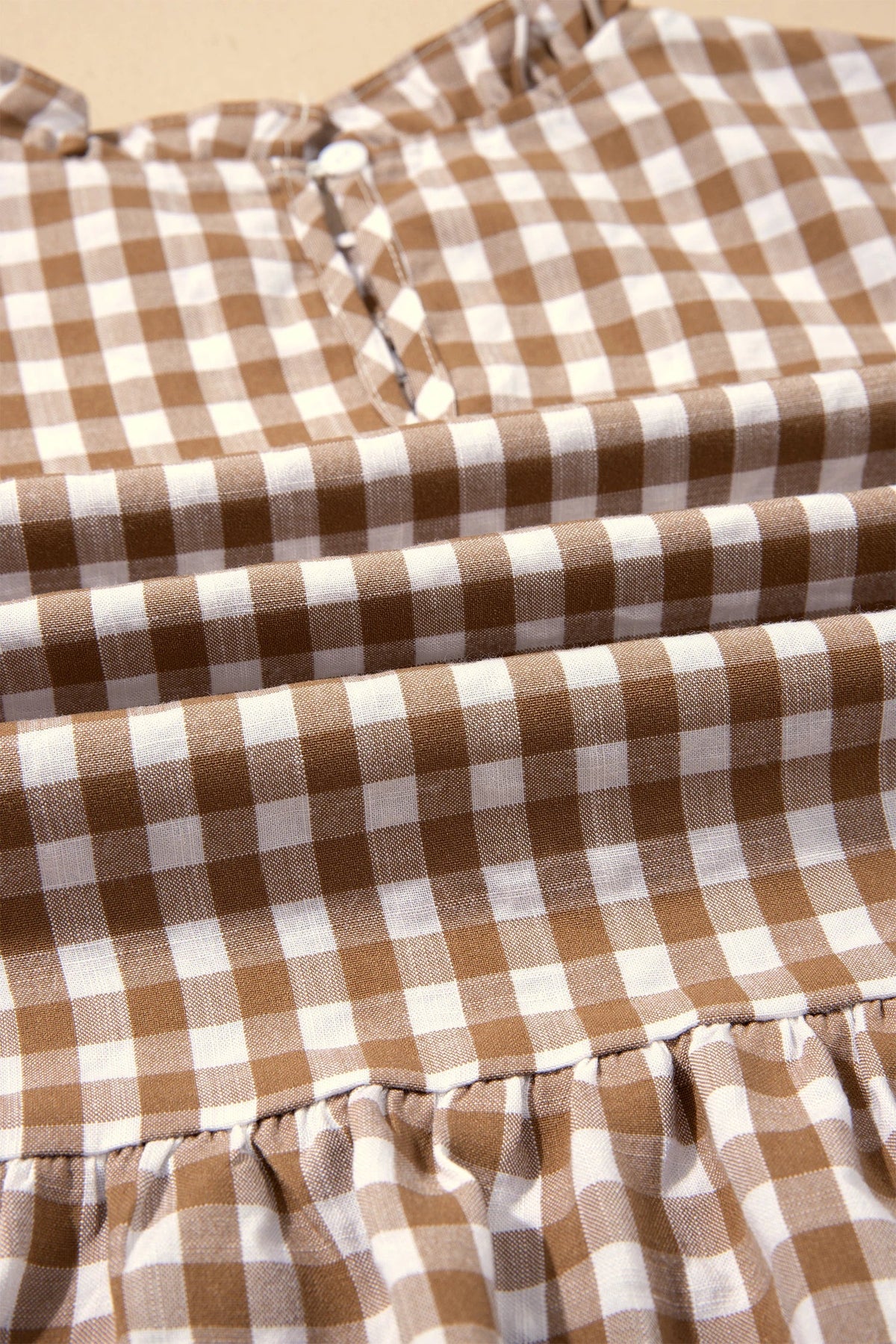 Gingham Smocked 3/4 Sleeve Ruffle Peplum Top