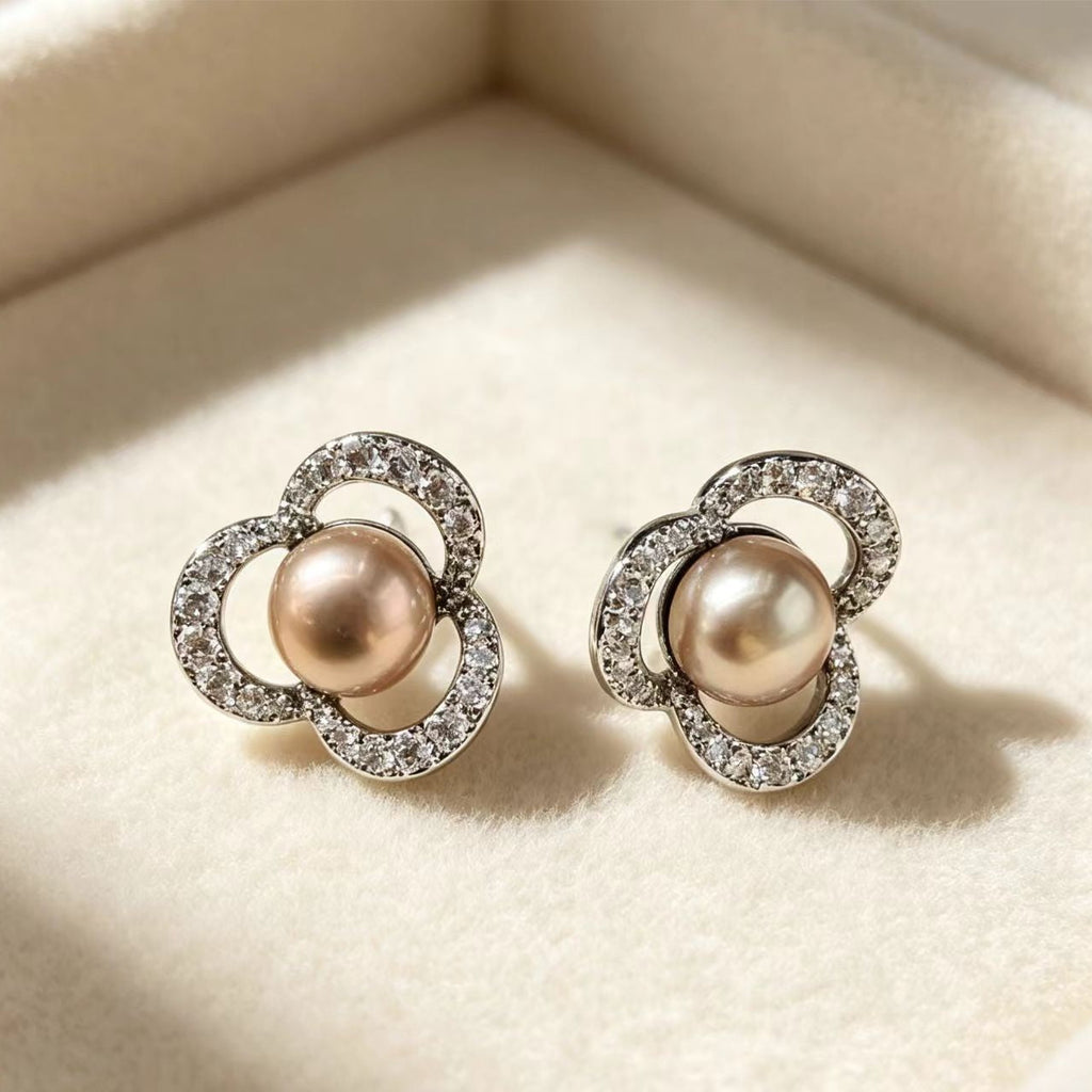 Hollow Four-Leaf Clover Diamond-Encrusted Champagne Pearl Womens Earrings