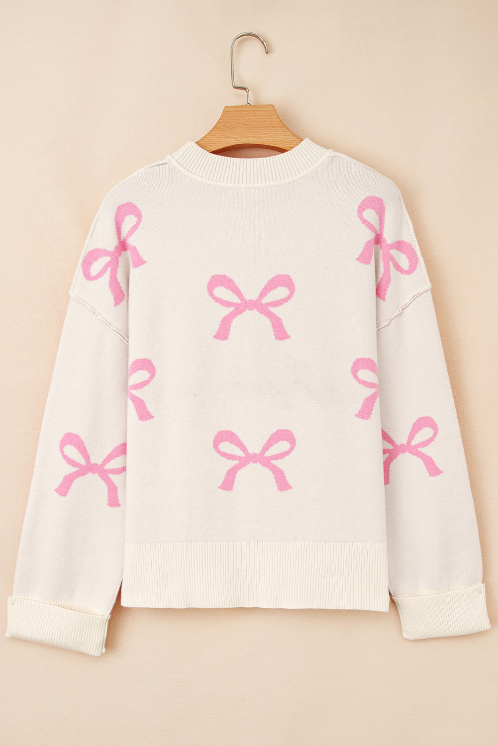 Pink Bow Print Ribbed Trim Exposed Seam Drop Shoulder Loose Sweater