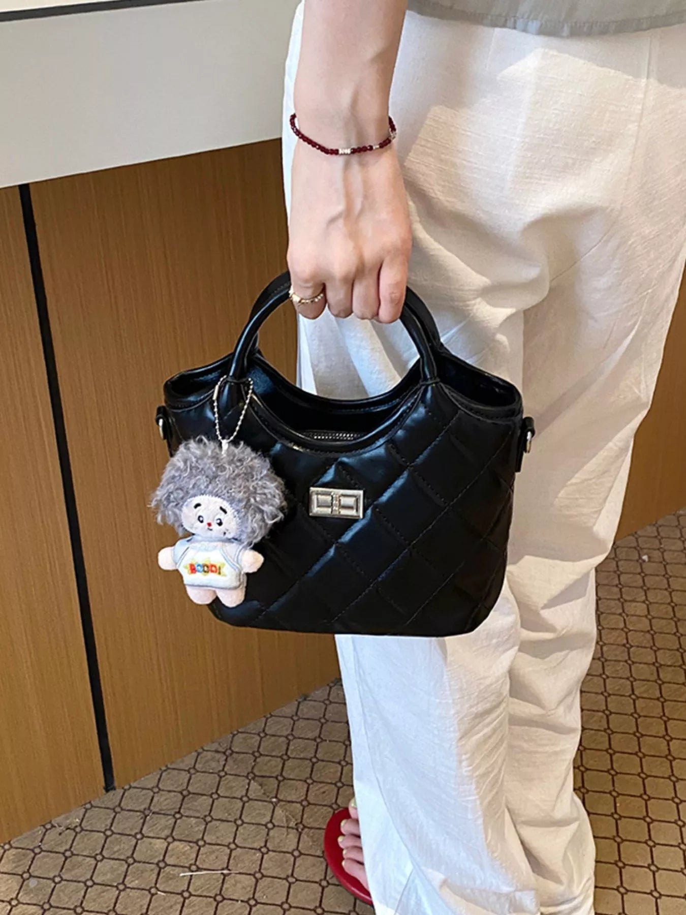 Quilted Crossbody Bag with Plush Charm