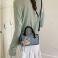 Denim Barrel Crossbody Bag