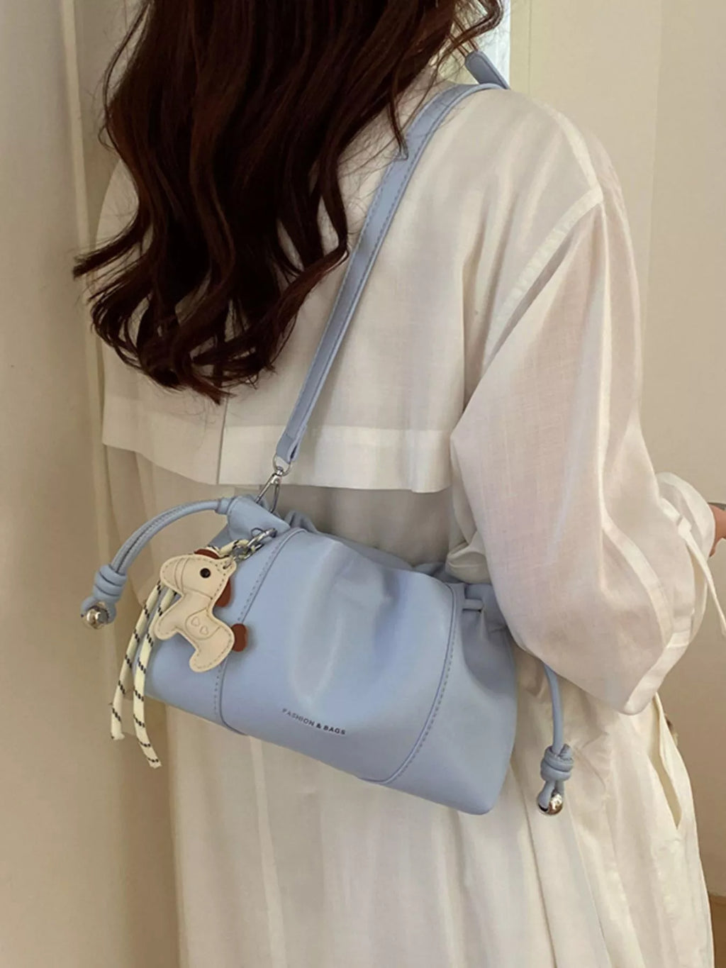 Drawstring Leather Crossbody Bag