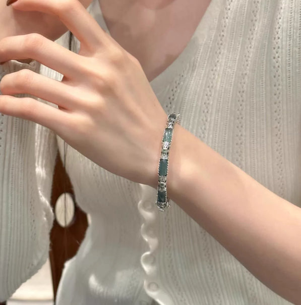 Plain-face Bracelet With An Open Design Featuring Blue-water Jade In A Traditional Ethnic Style