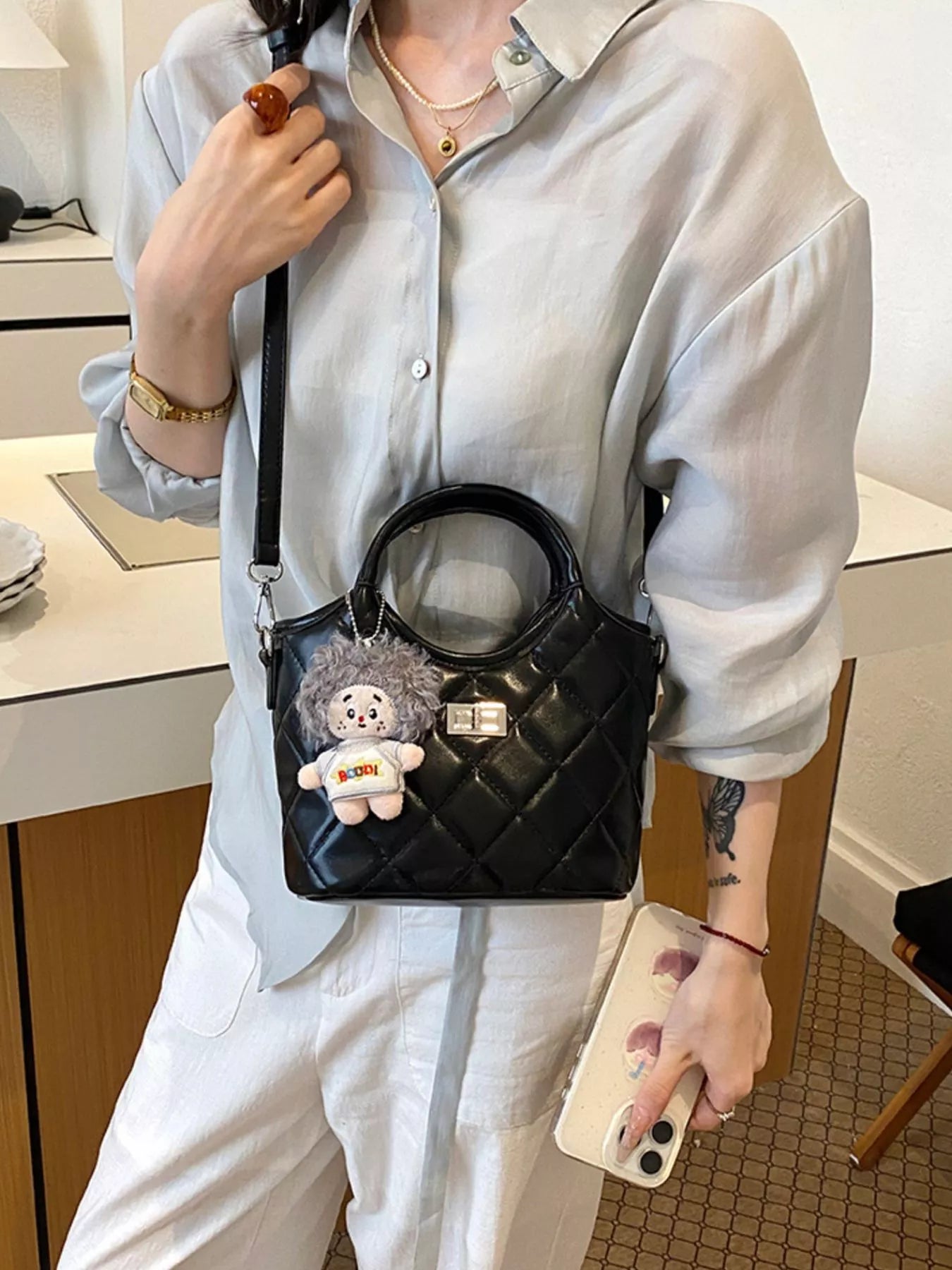 Quilted Crossbody Bag with Plush Charm