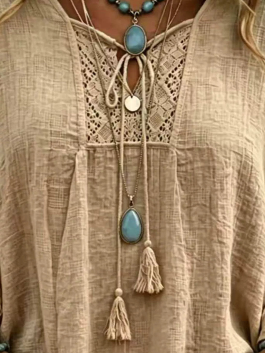 Full Size Tassel Tie Neck Ruffled Hem Blouse Plus Size