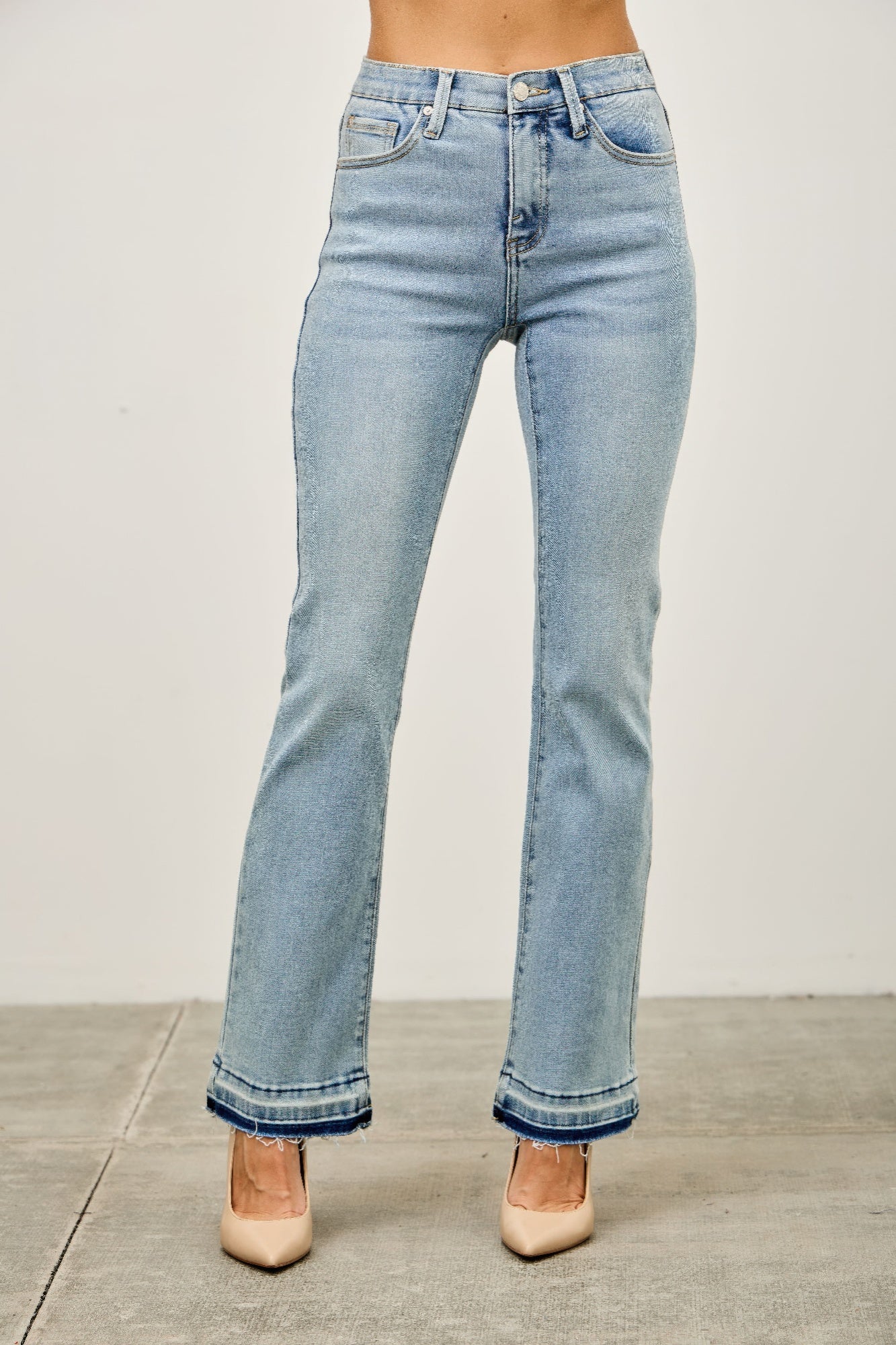 Mid Rise Flare With Released Hem