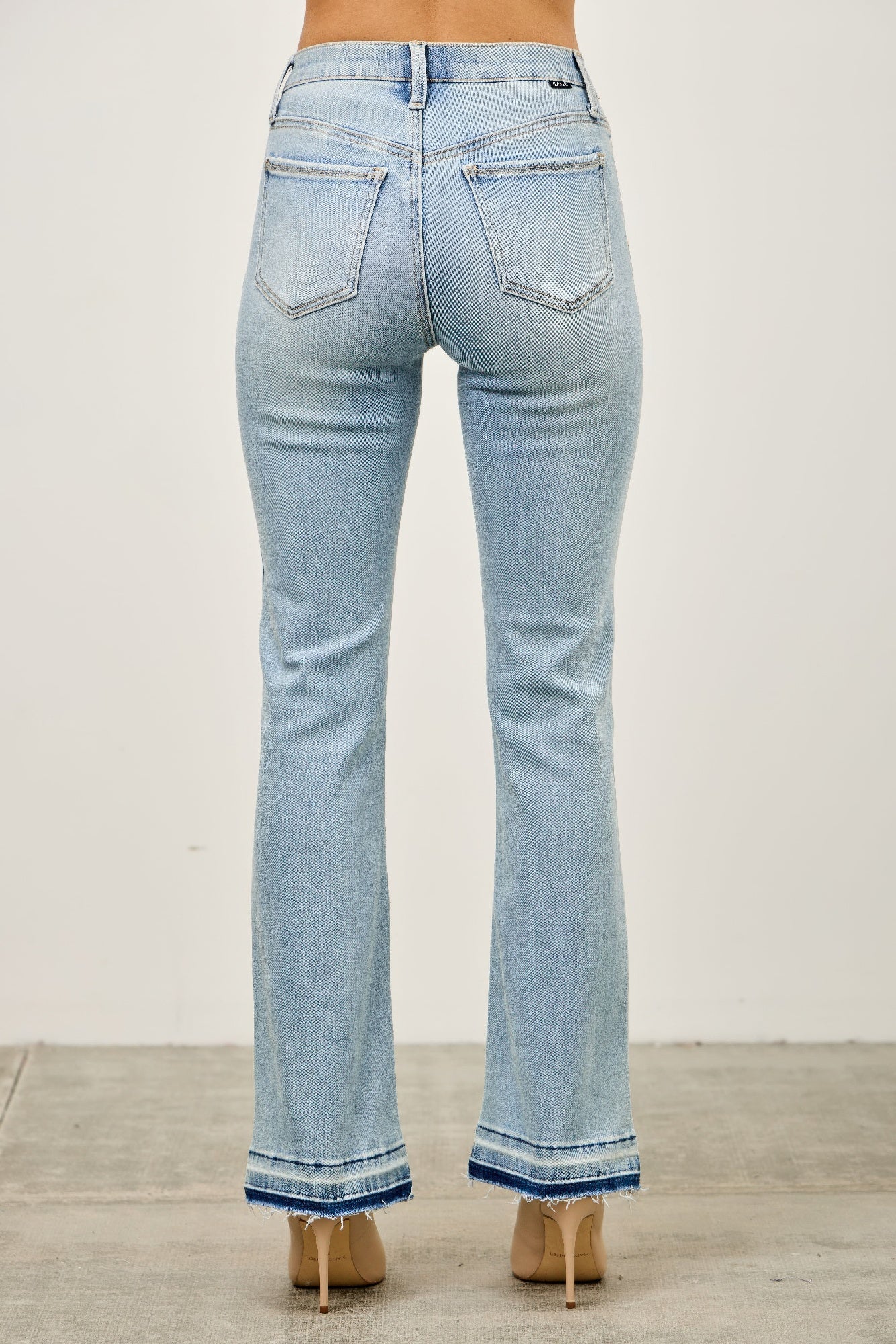 Mid Rise Flare With Released Hem