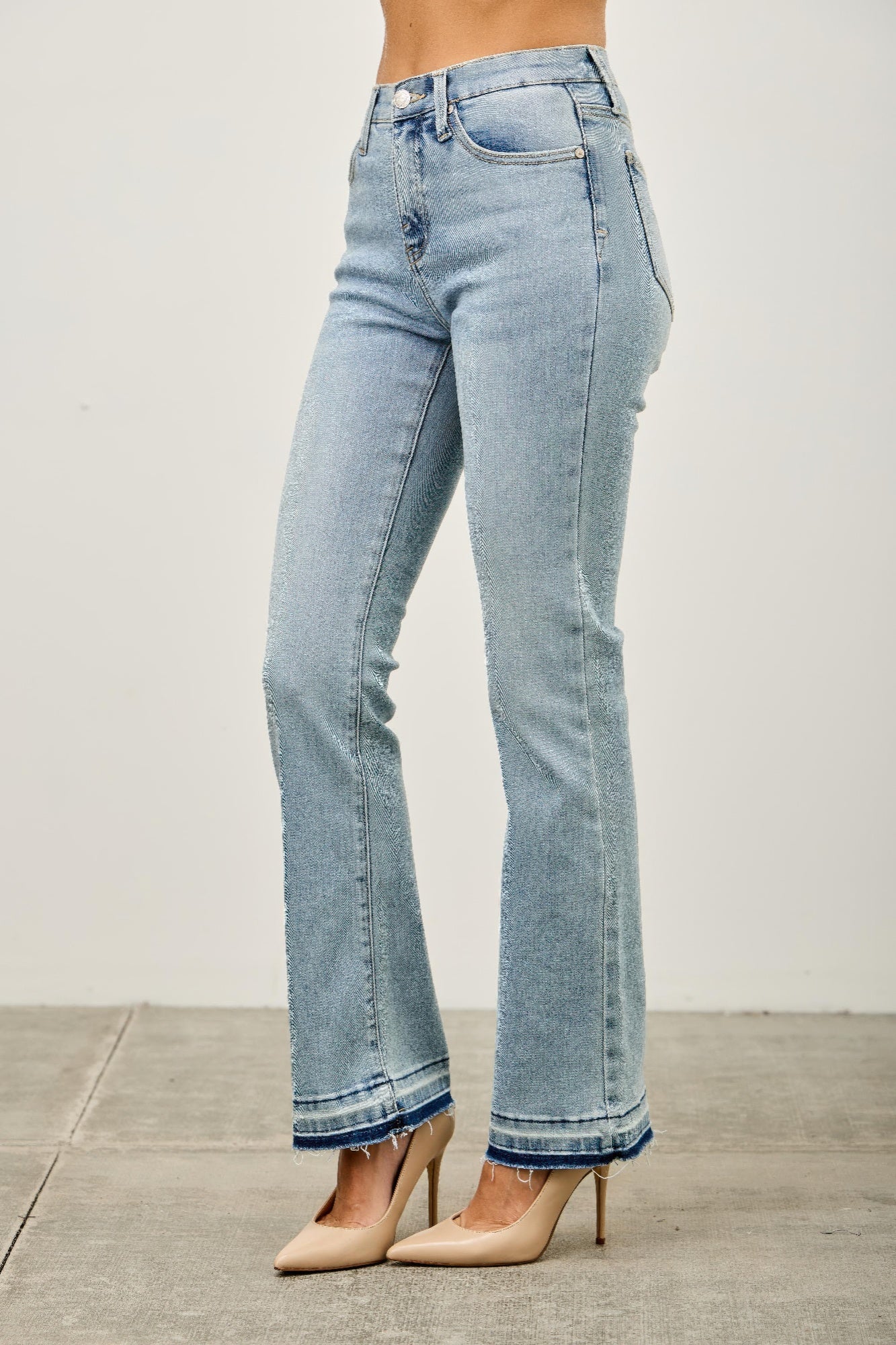 Mid Rise Flare With Released Hem