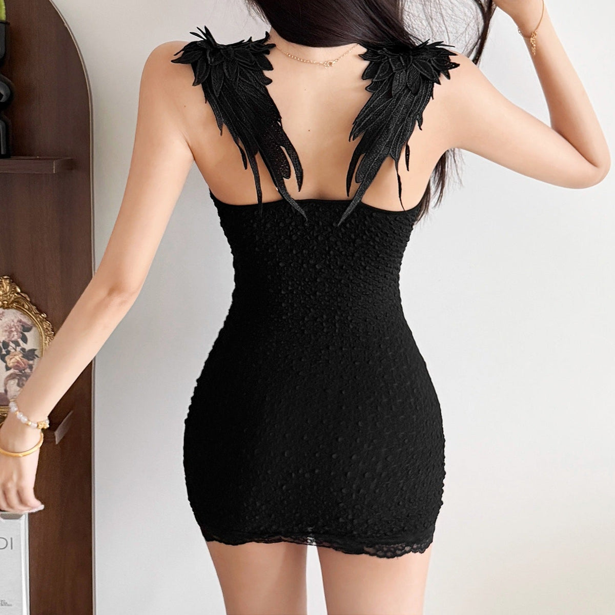Summer Women Clothing Sexy Wind Feather Decoration Spaghetti Straps Slimming Package Hip Dress
