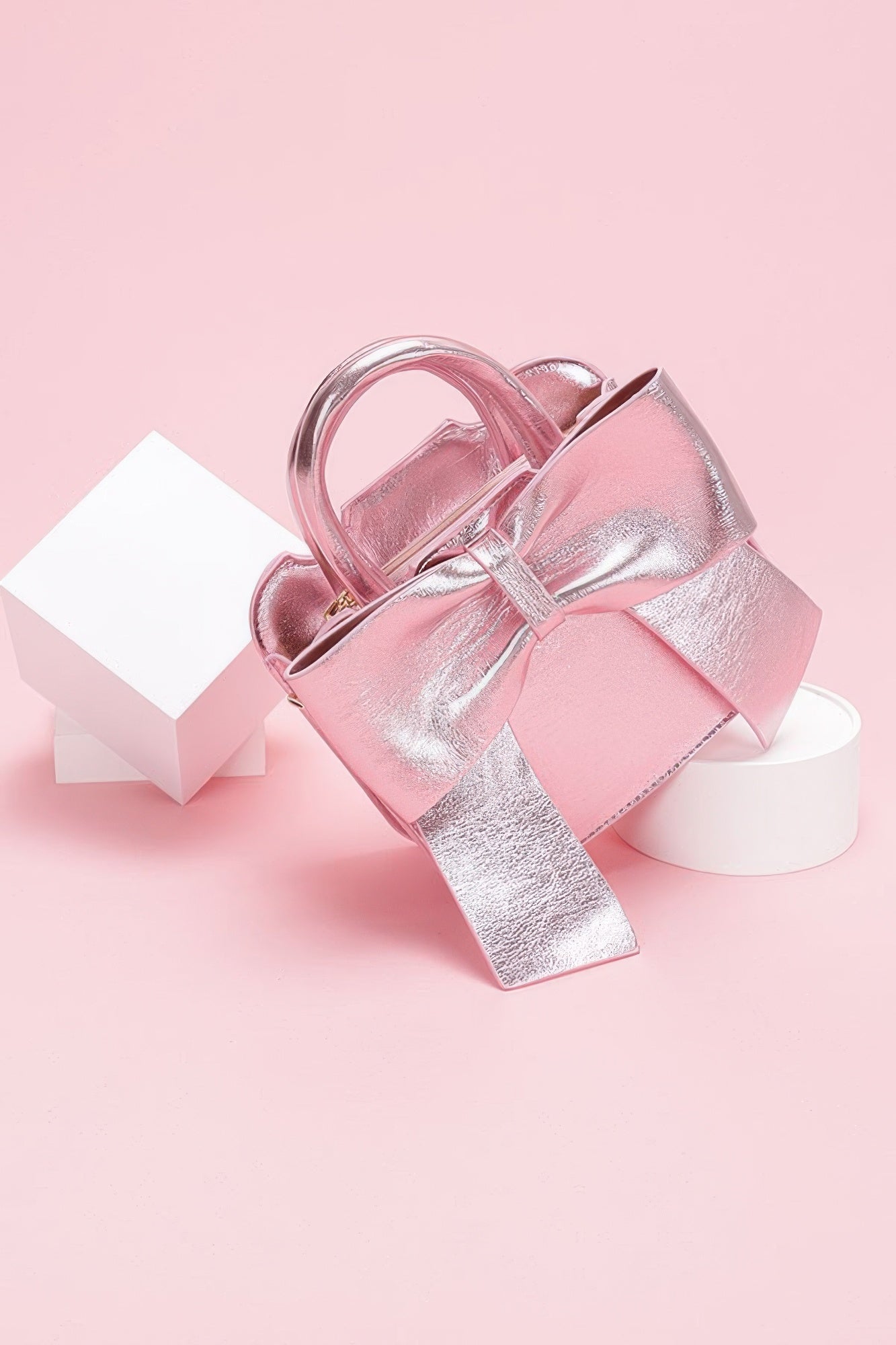 Metallic Bow Front Top Handle Clutch
