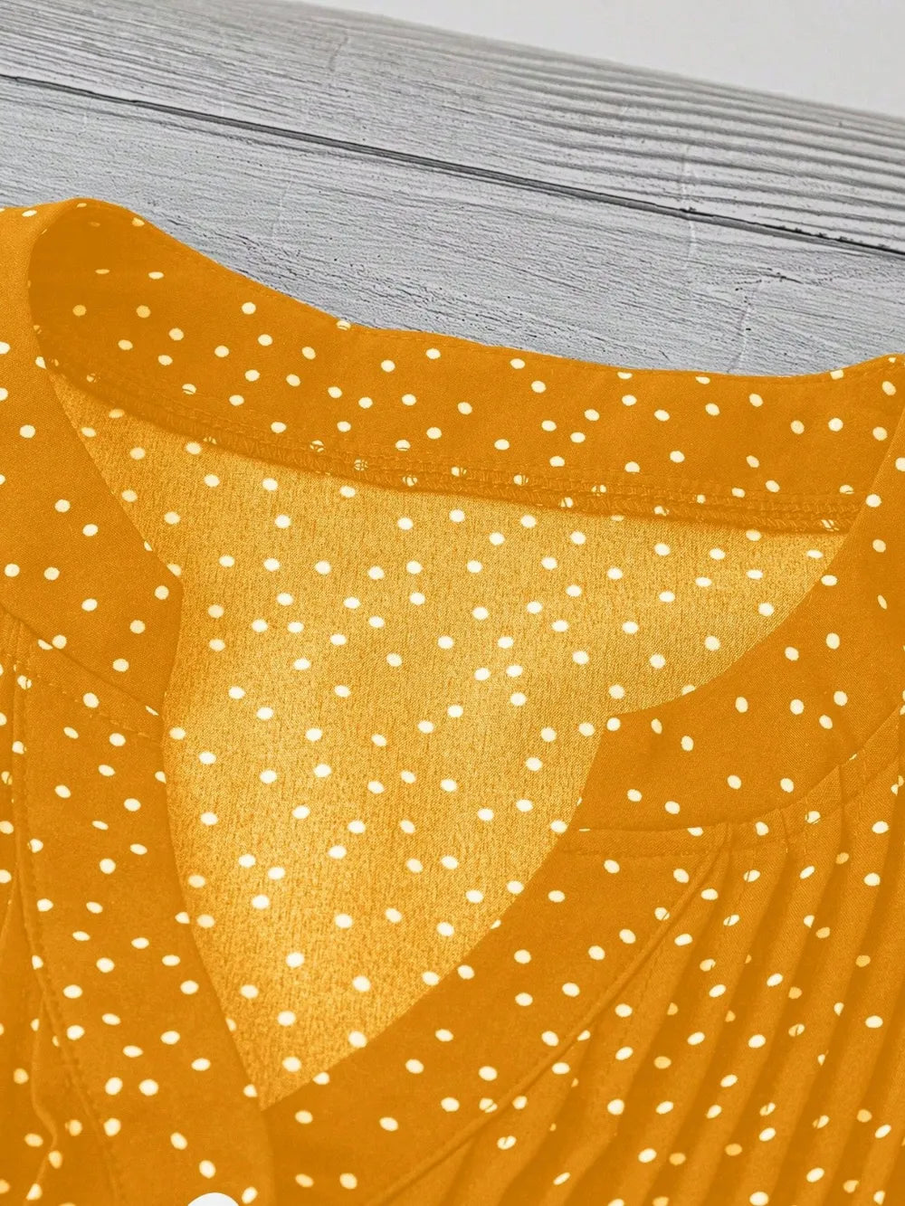 Polka Dot Notched Ruffled Cap Sleeve Blouse