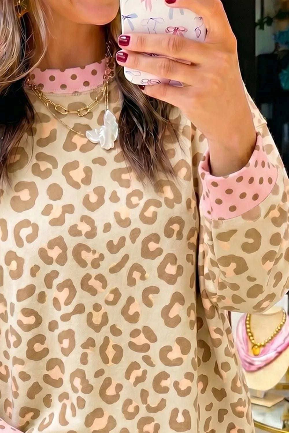 Leopard Print Sweatshirt with Polka Dot Accents