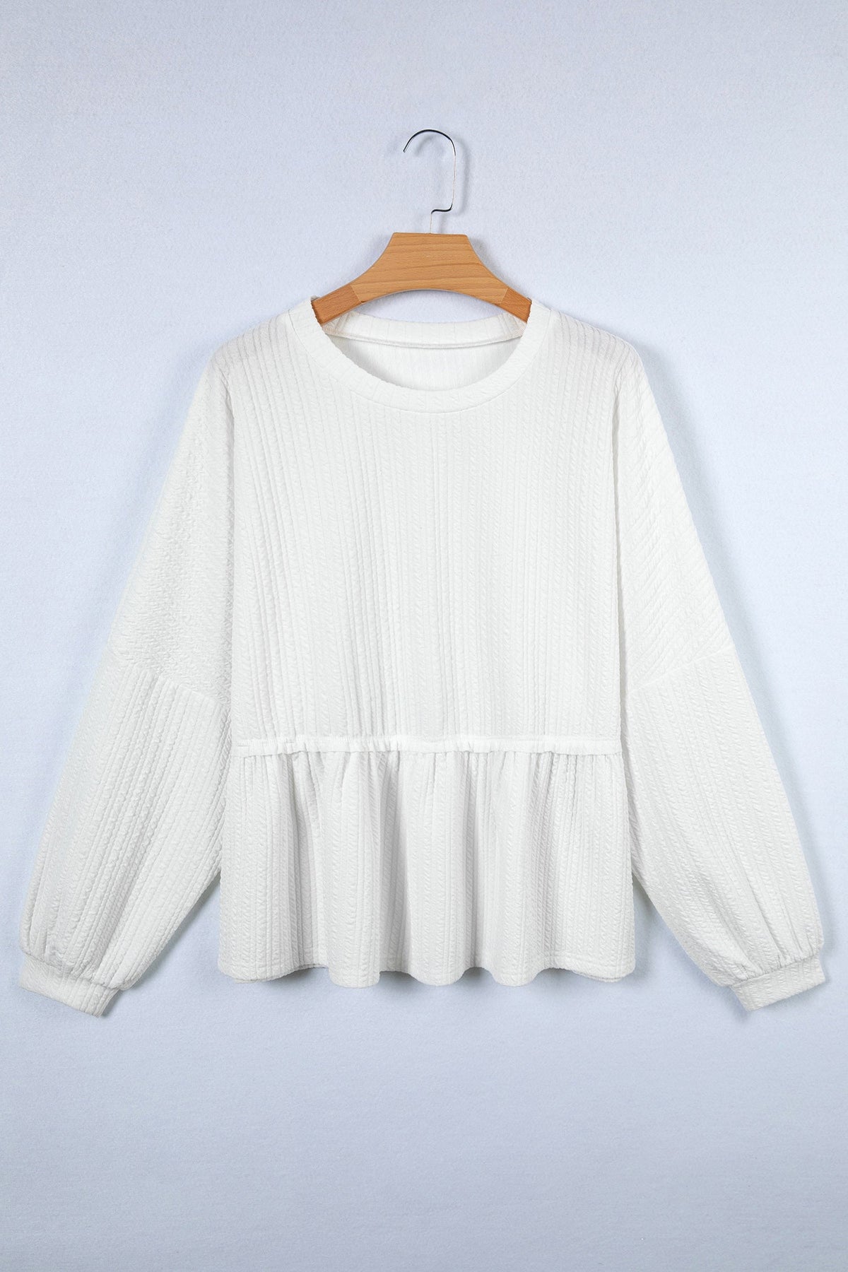 Solid Textured Drop Shoulder Peplum Top
