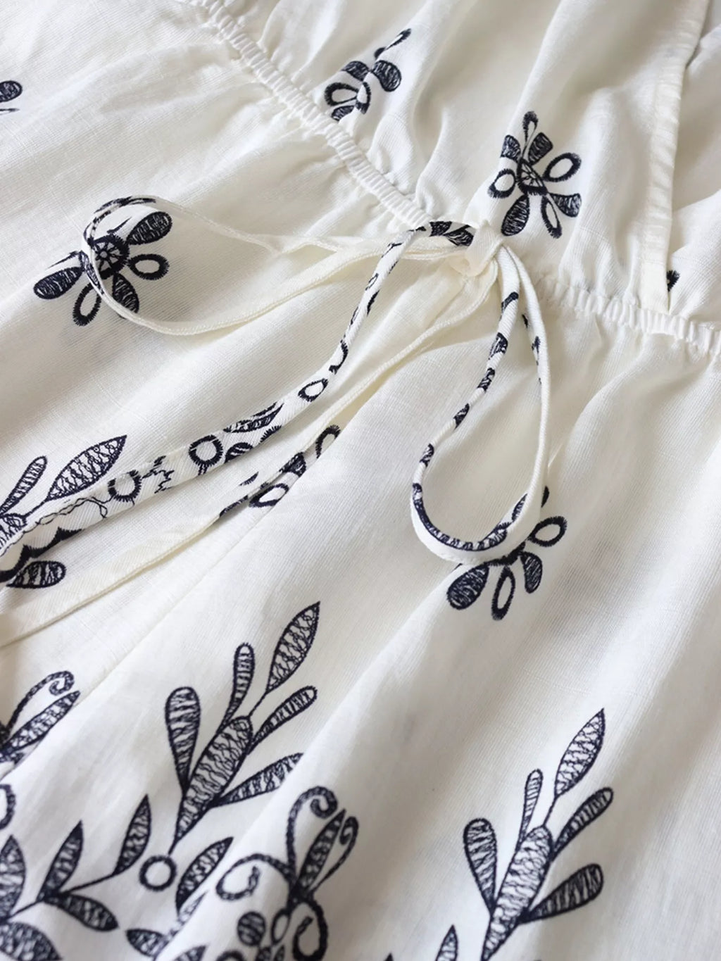 Printed Surplice Half Sleeve Romper