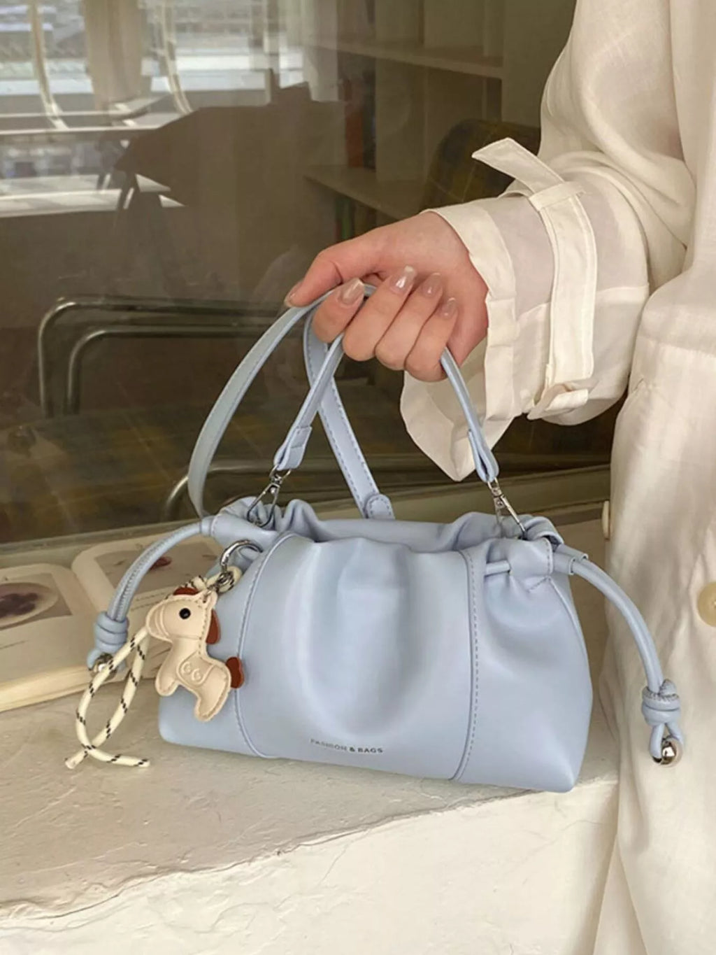 Drawstring Leather Crossbody Bag