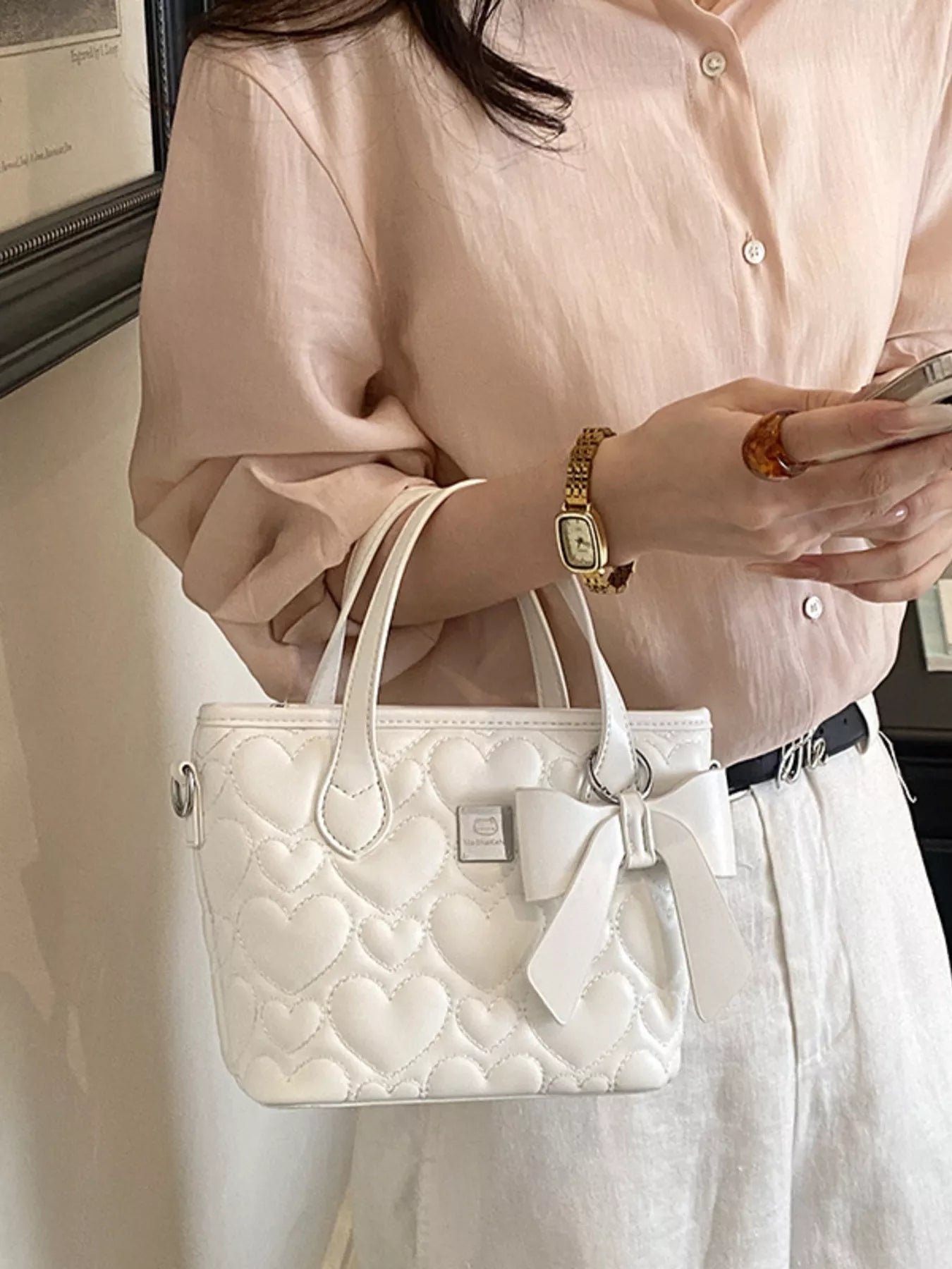 Chic Quilted Heart Crossbody Bag with Bow Accent