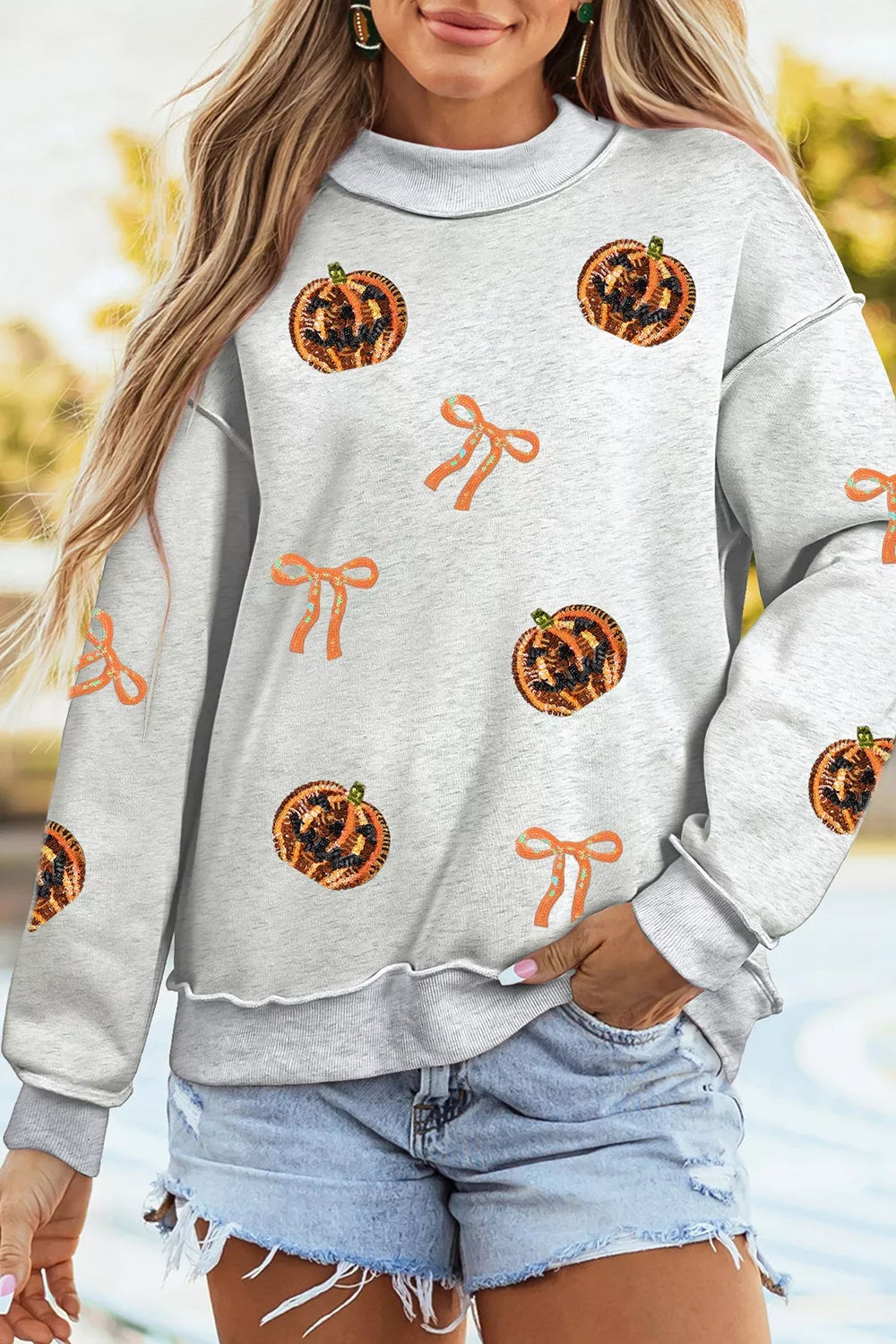Sequin Pumpkin Face Bow Exposed Seam Halloween Sweatshirt