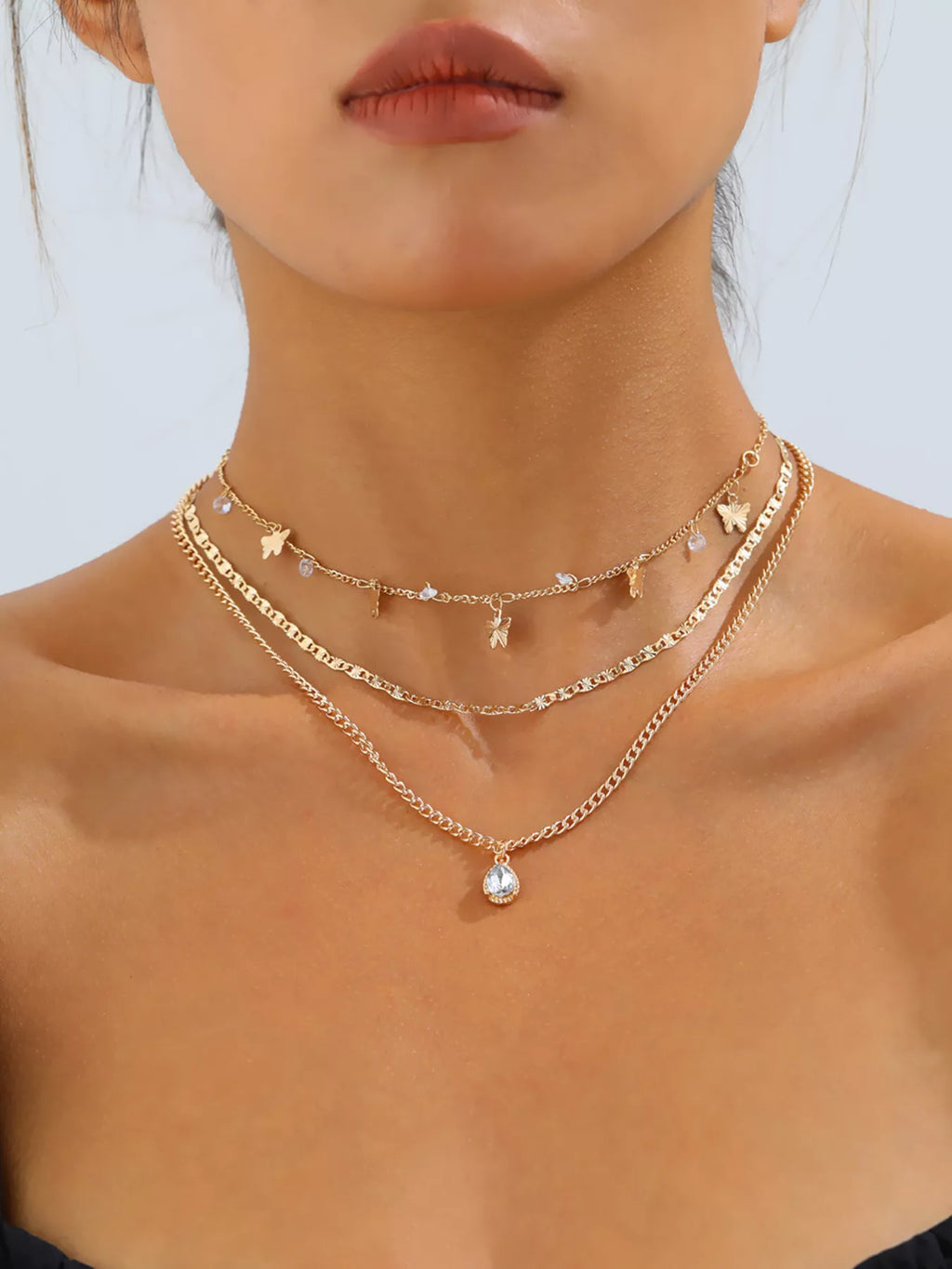 Layered Alloy Necklace with Butterfly and Zircon Charms