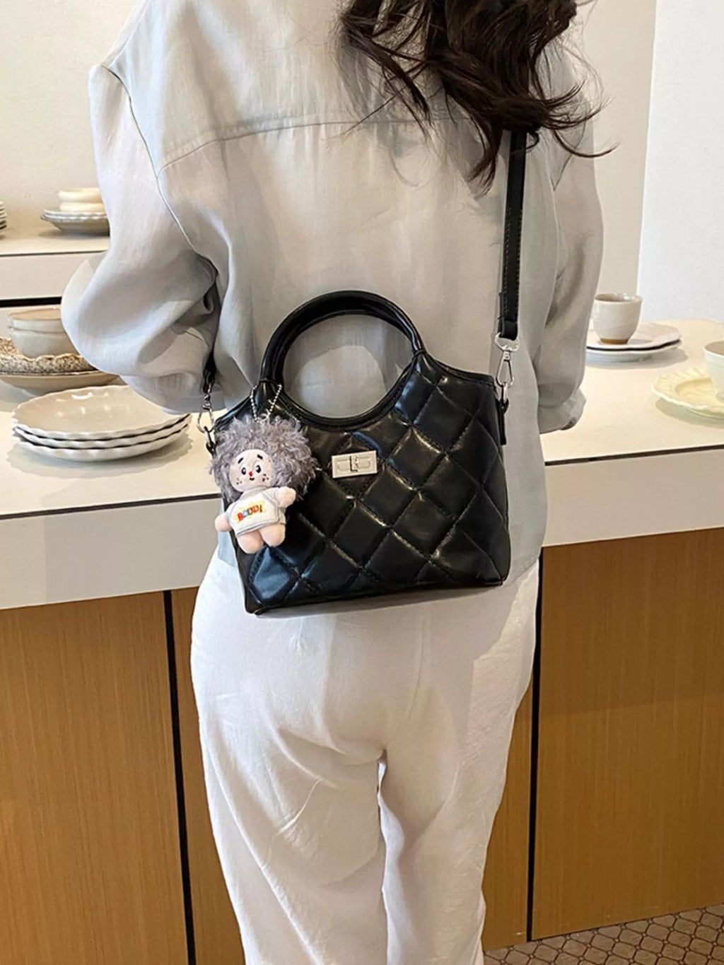 Quilted Crossbody Bag with Plush Charm