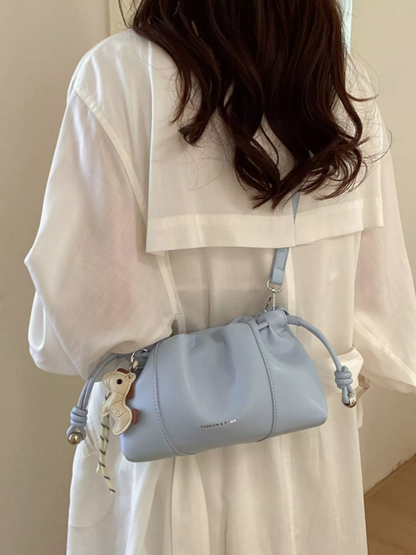 Drawstring Leather Crossbody Bag