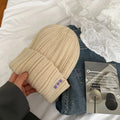 Knitted Beanie Hat with Embroidered Detail