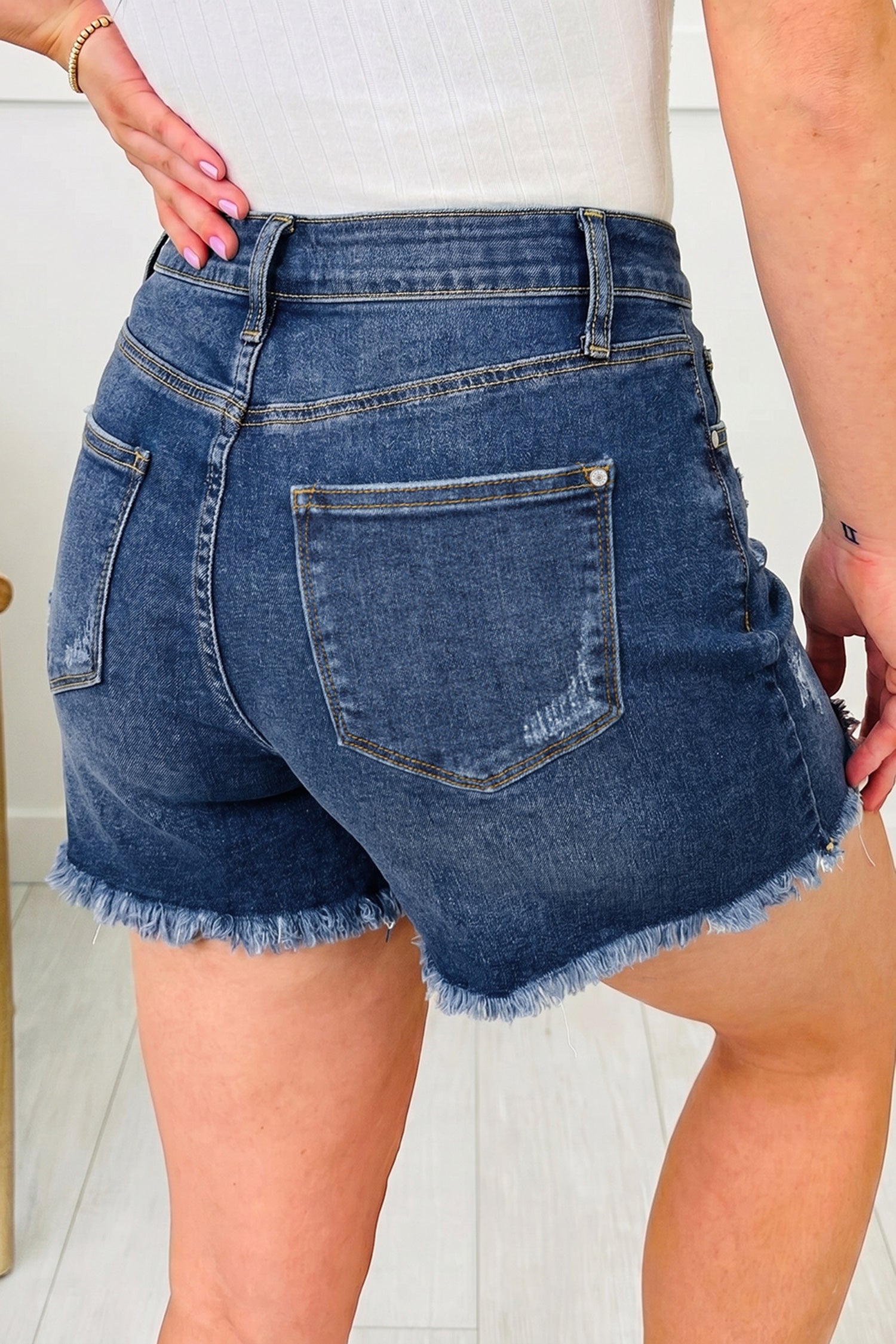 Sail Blue Asymmetric Raw Hem Distressed Whiskery Denim Shorts