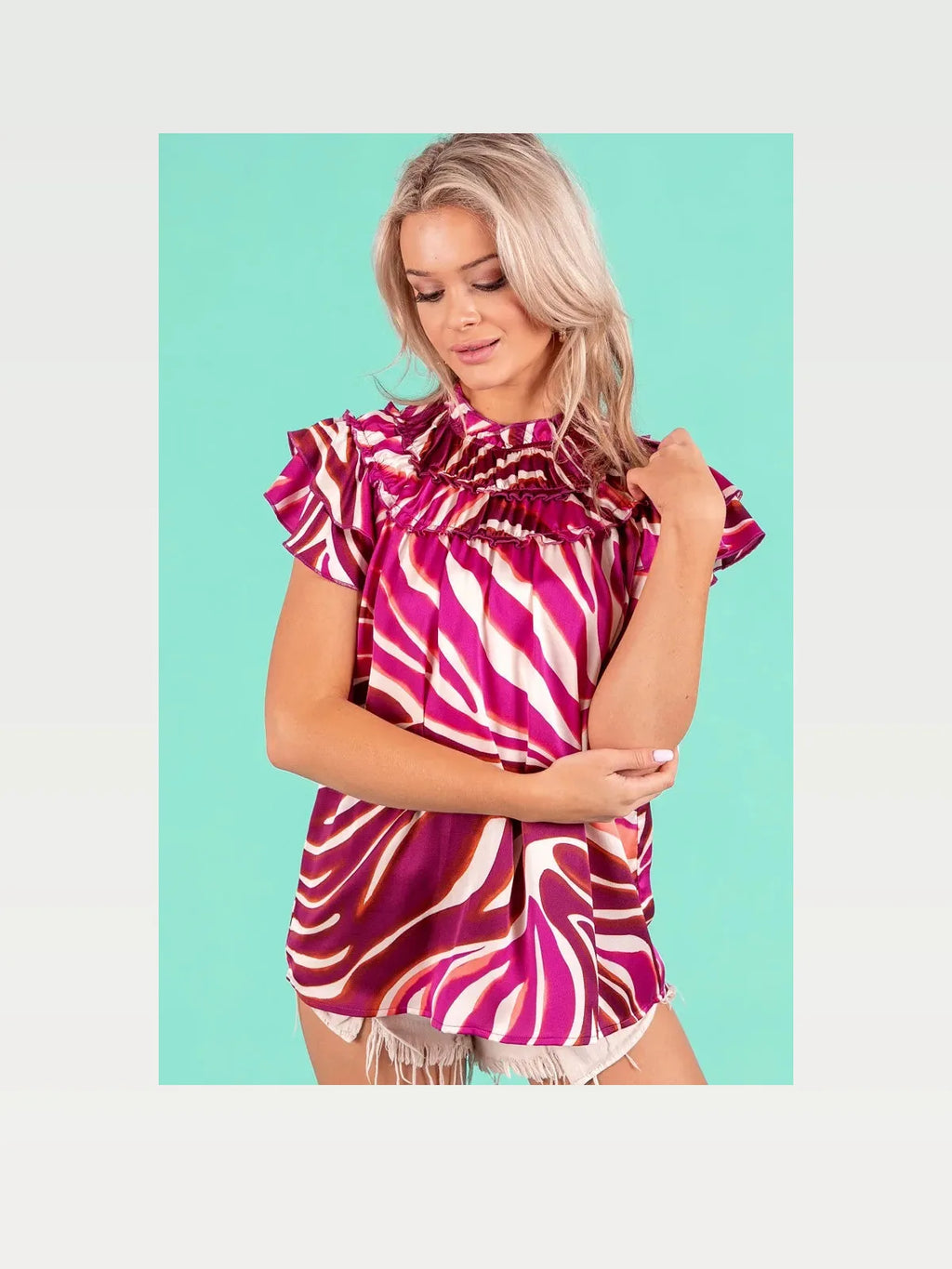 Zebra Print Top with Tiered Ruffle Neckline